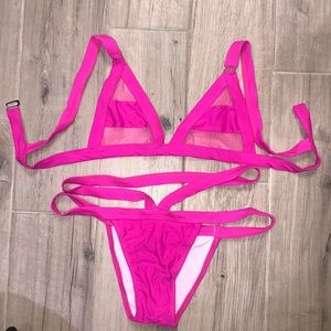 Hot Pink Mesh top, strappy bottom skimpy.